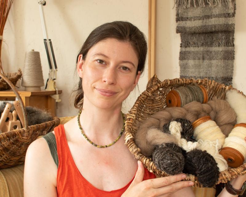 June update - a snack sized spinning project and pocket knitting