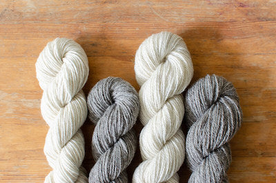 Undyed white and grey British wool yarn skeins