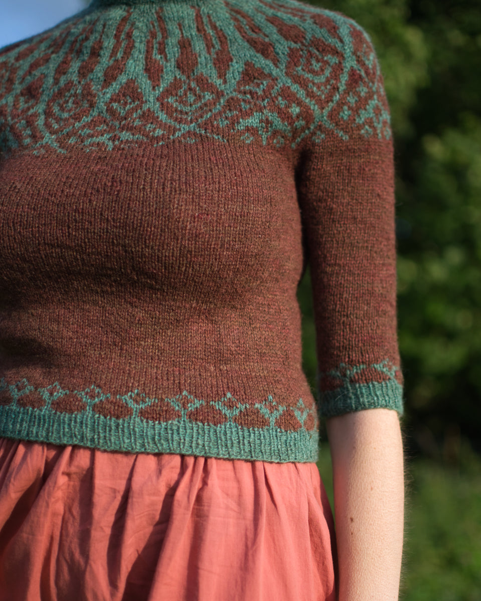 Detail of the Opula stranded colourwork hem and cuffs